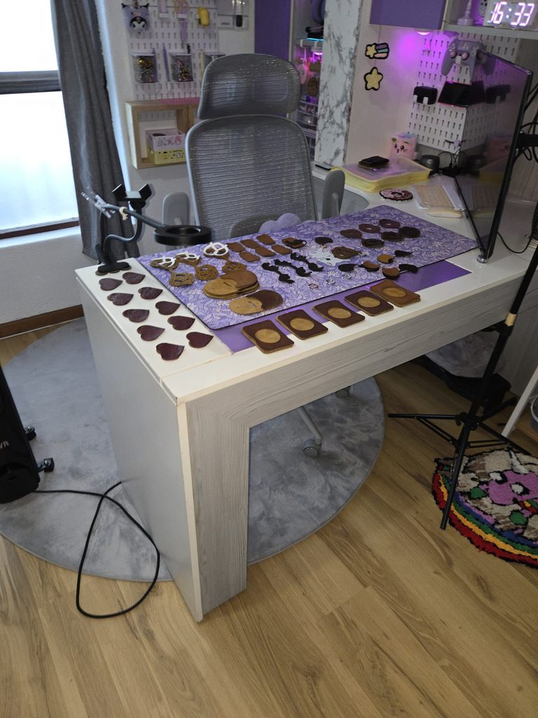 Leather accessories laid out in the LotsaLoops Cape Town workspace during the handmade production process