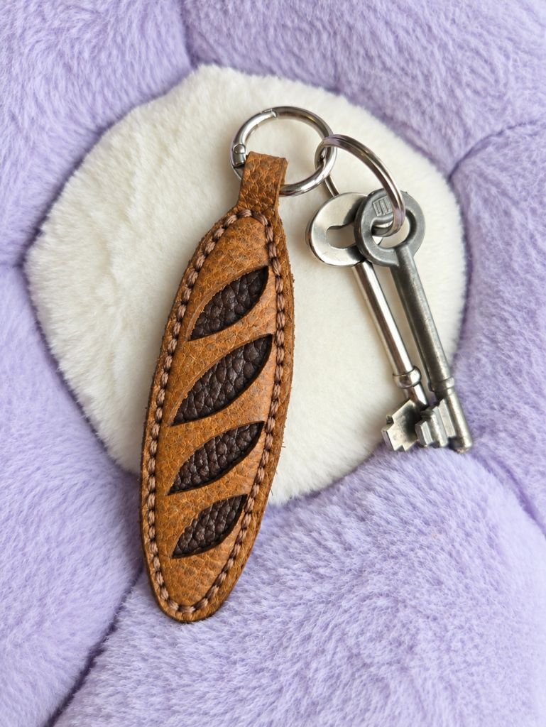 Leather baguette keyring attached to keys